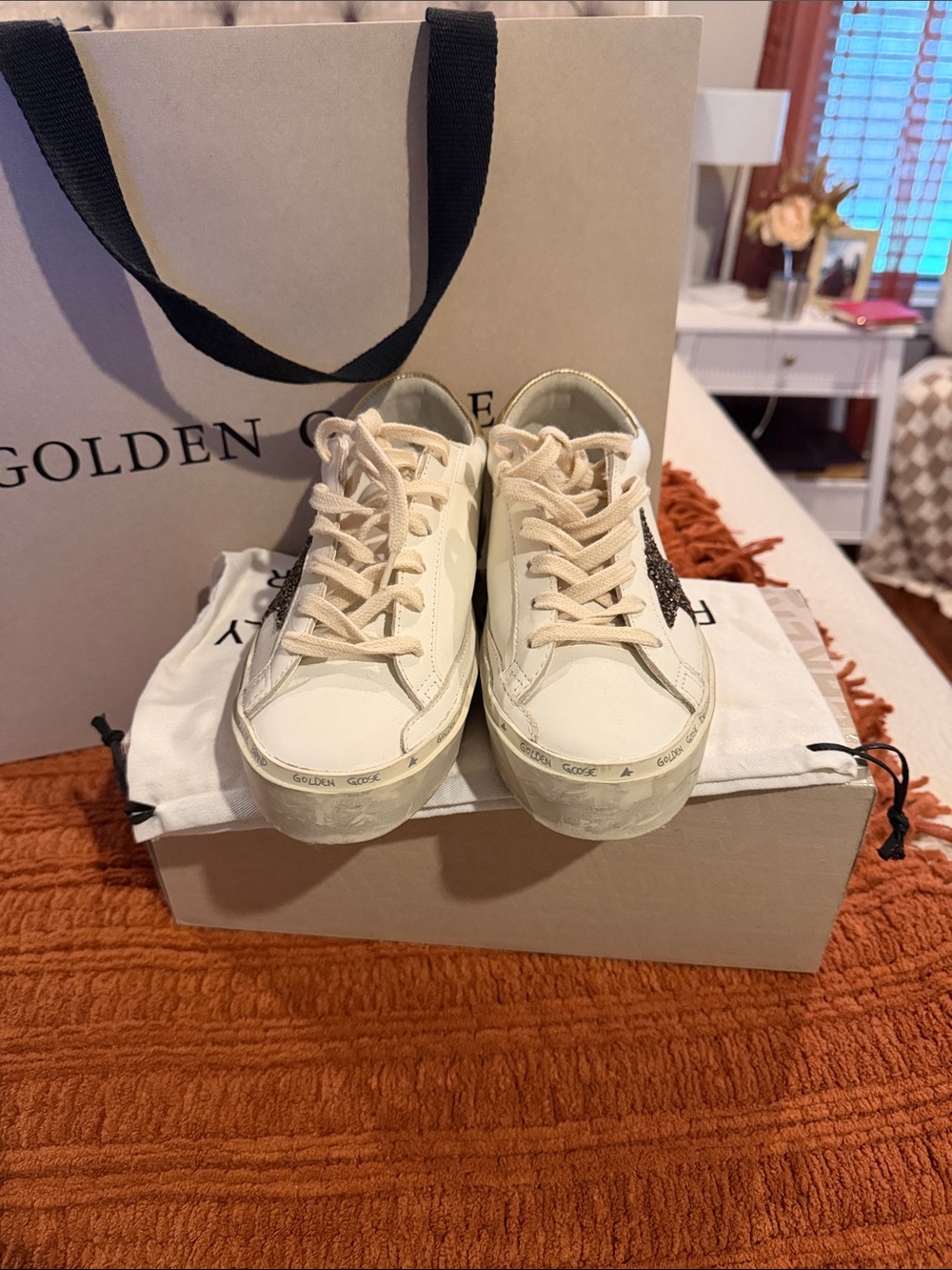 Golden Goose White Leather Sneakers with Gold Heel Tab and Black Glitter Star